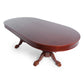 Oval dining top on Rockwell game table in a mohagany finish.